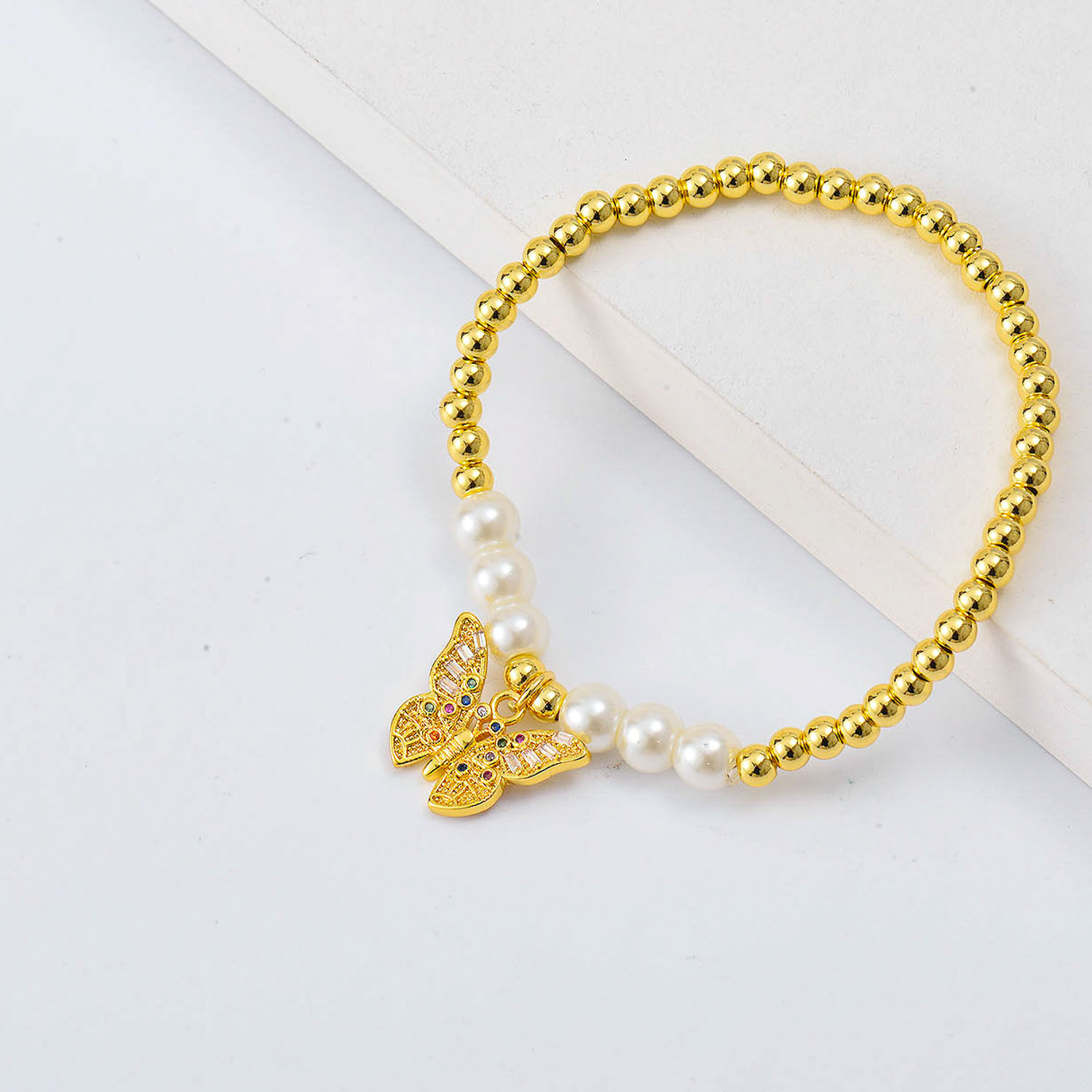 Pulseras de moda Oro Laminado con mariposa y perlas