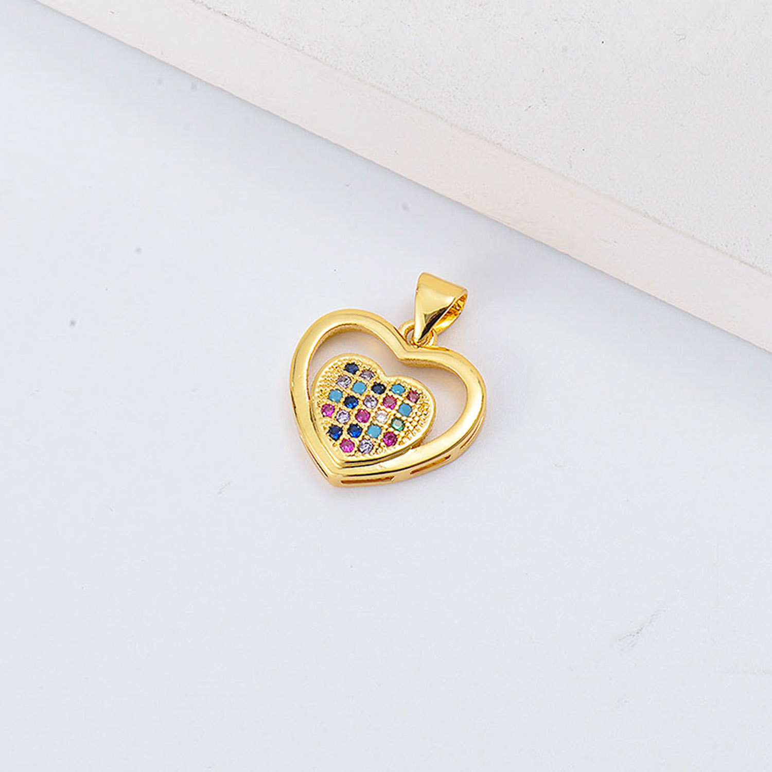 dije para playa con corazon de piedras