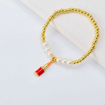 Pulseras de aesthetic Oro Laminado con lapiz labial y perlas