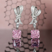 aretes de cuarzo rosa diamantes en forma de lazo para mujer