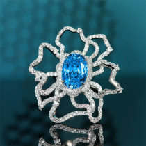 anillo de topacio azul y diamante para mujer