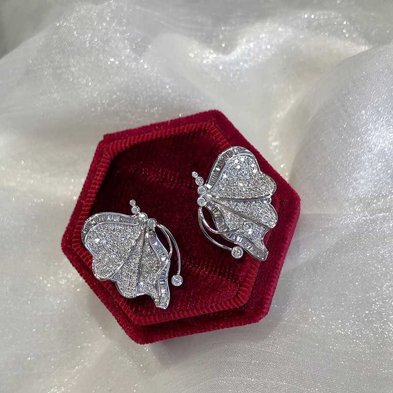 aretes bonitos de mariposa de oro 18k con diamantes para mujer