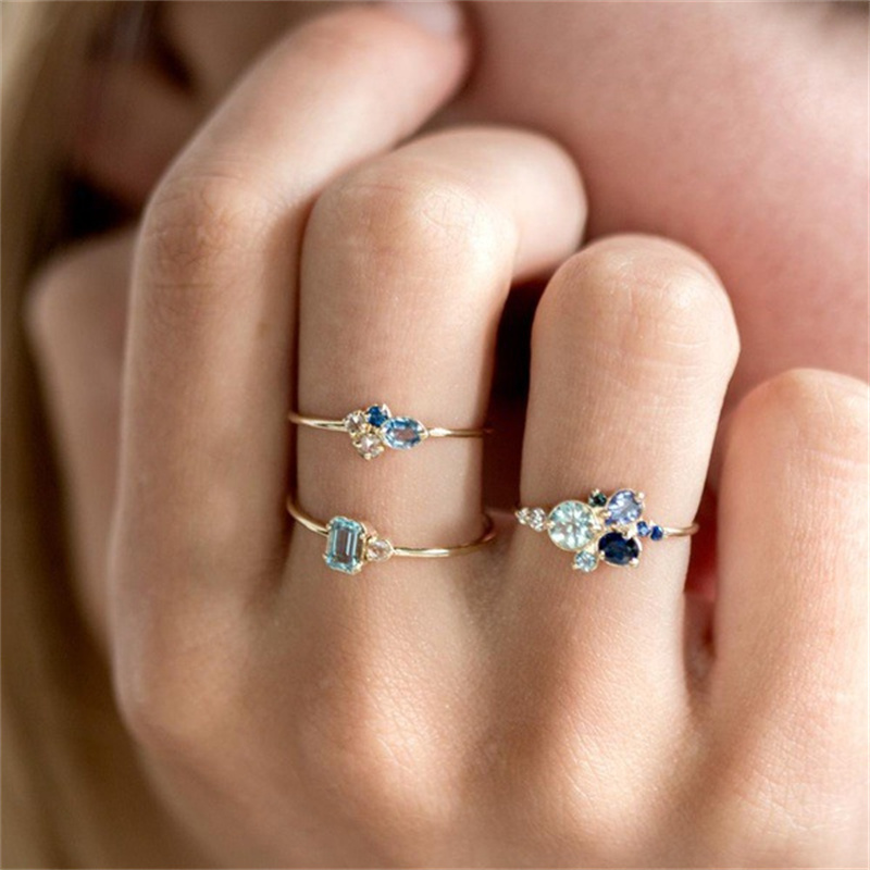 conjunto de anillos de oro con aguamarina para mujer
