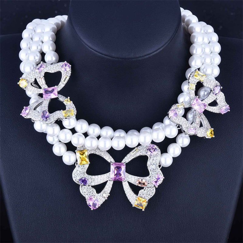 collares bonitas de perla con lazo de diamantes y cuarzo rosa para mujer