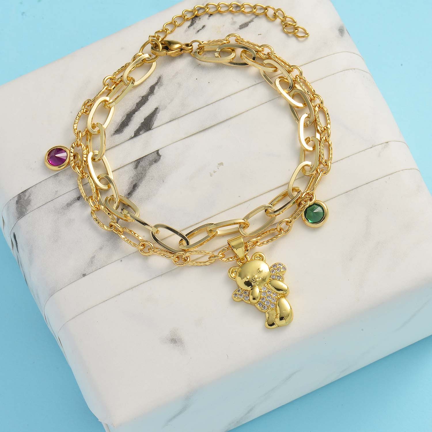 US$ 4.40 - pulsera dorada para mujer en doble cadena con osito dorado -  Joyas De Acero Por Mayor