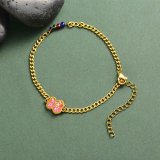 pulsera de acero dorado con charm de osito rojo para mujer