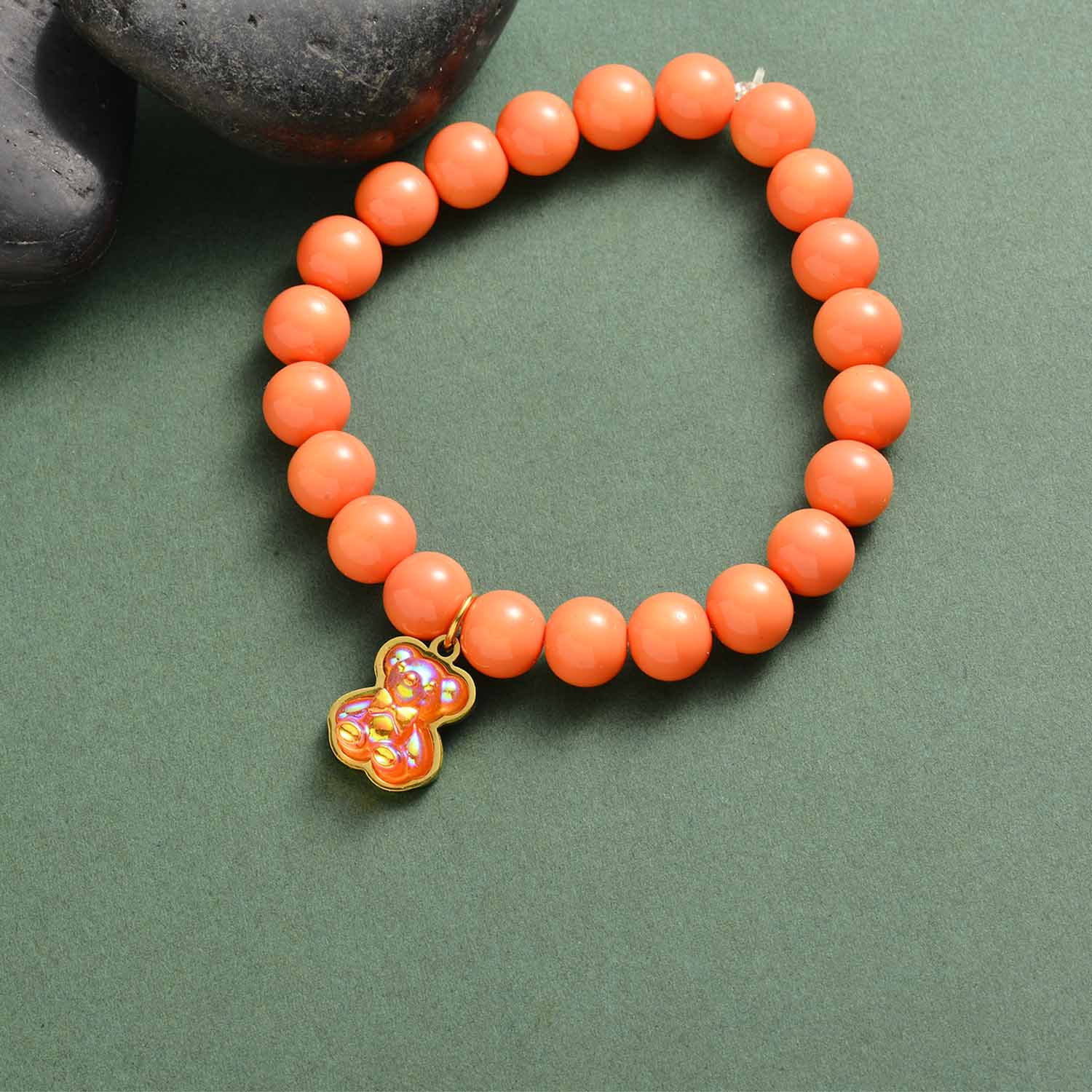 pulsera de bolitas con charm osito color naranjada para mujer