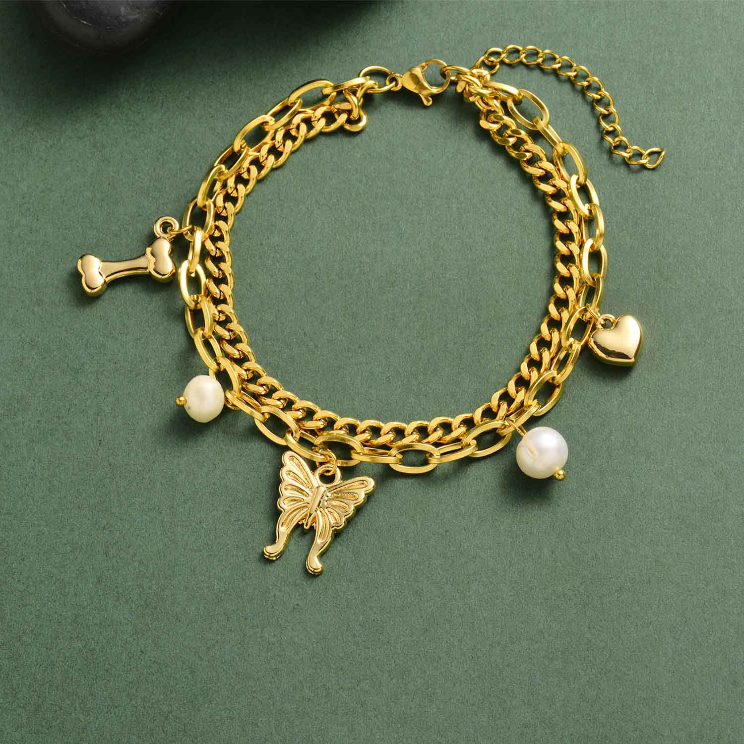 pulsera especial en doble cadena con perlas mariposa dolor doardo