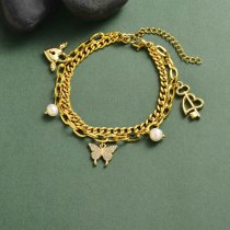 pulsera acero en trible cadena con perlas mariposa charm 18K