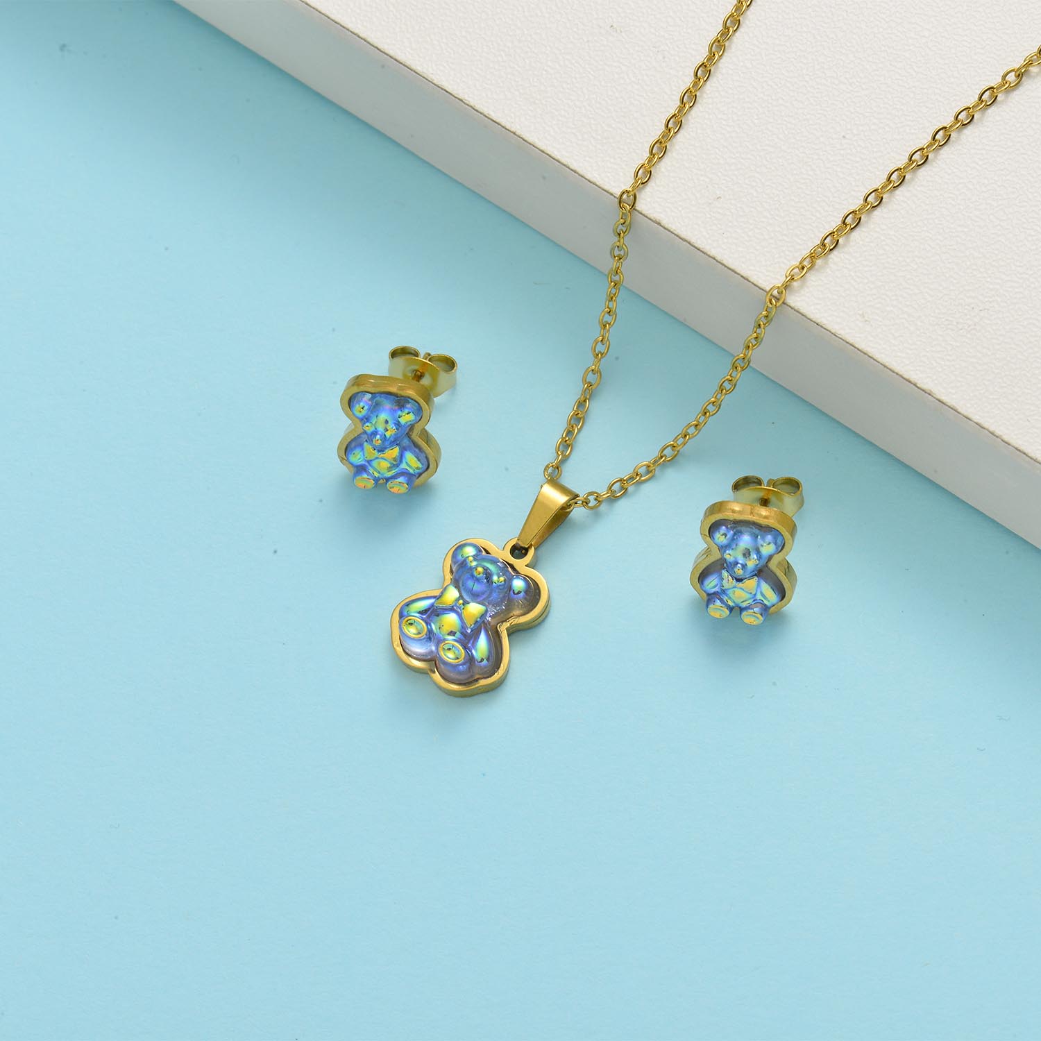 conjunto de acero con arete para mujer con dije de osito de multi colores