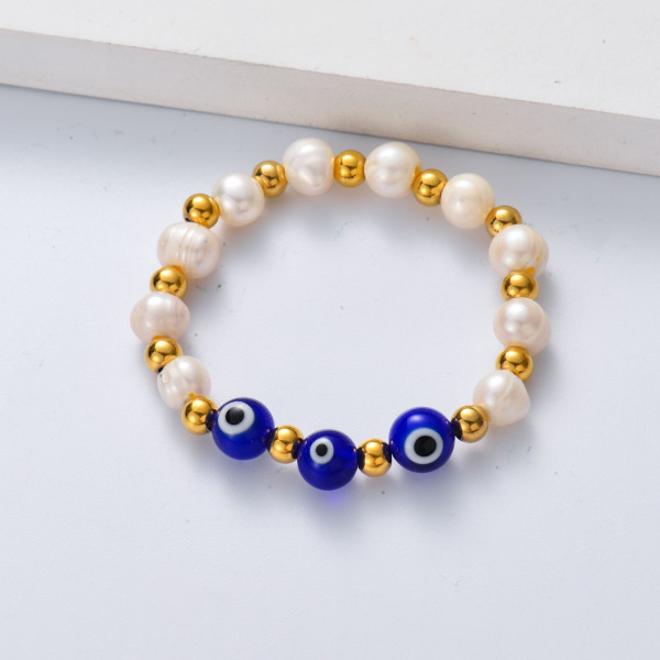 pulsera de perlas con bolitas de evil eyes azul para mujer por mayor