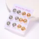 aretes de dorado y plateado en carton diseno nuevo con piedras para mujer