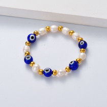 pulsera de perlas con bolitas de evil eyes azul para mujer por mayor