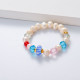 pulsera de perlas con bolita con colores por mayor