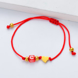 pulsera de hilo rojo para mujer con corazoncito dorado charm rojo acero 18K