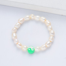 pulsera de perla natural estilo de playa con dije verde para mujer