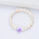 pulsera de perla natural estilo en moda  con dije morado para mujer