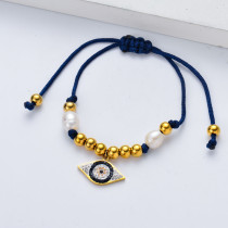 pulsera de hilo azul con fatima de ojo blanco y perla natural para mujer