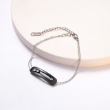 pulsera negro con cadena plateado y 3 cristal movil