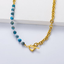 cadena de acero color dorado con piedra natural semi precious de carbono azul con asesorio de corazon para mujer