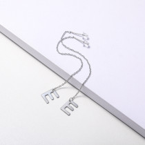 aretes con letras diseno nuevo acero color plateado para mujer