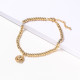 pulsera de acero color dorado con bolitas dije especial diseno en moda para mujer