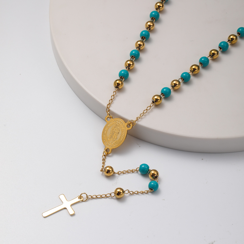 collar aesthetic de rosario con dijes y colgante cruz y bolita azul