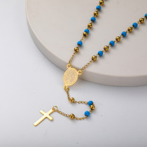 collar de rosario de moda con bolita azul y dorada para mujer