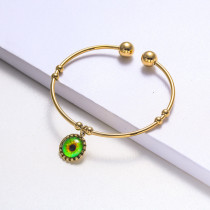 pulsera de acero con ojo de fatima color dorado estilo en moda para mujer