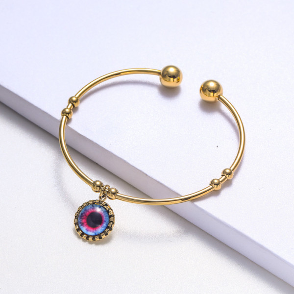 pulsera de acero con ojo de fatima color dorado estilo en moda para mujer