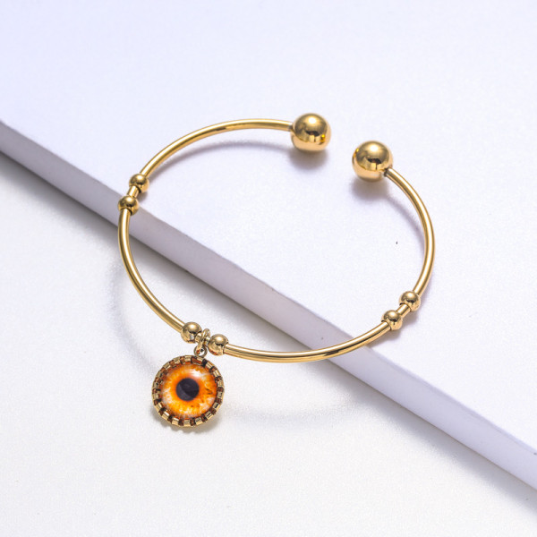 pulsera de acero con ojo de fatima color dorado estilo en moda para mujer