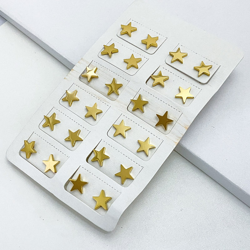 aretes en carton  de estrellas color dorado al por mayor