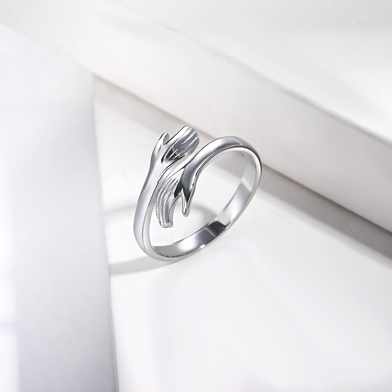 anillo ajustable con forma de manos por mayor para mujer