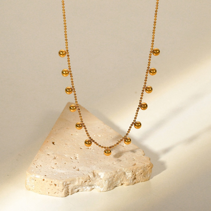 Collar de acero inoxidable con borla de cuentas pequeñas chapadas en oro de 18 quilates a la moda