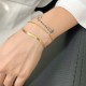 Pulsera de acero inoxidable chapada en oro de 18 quilates con cadena de serpiente de doble capa de moda