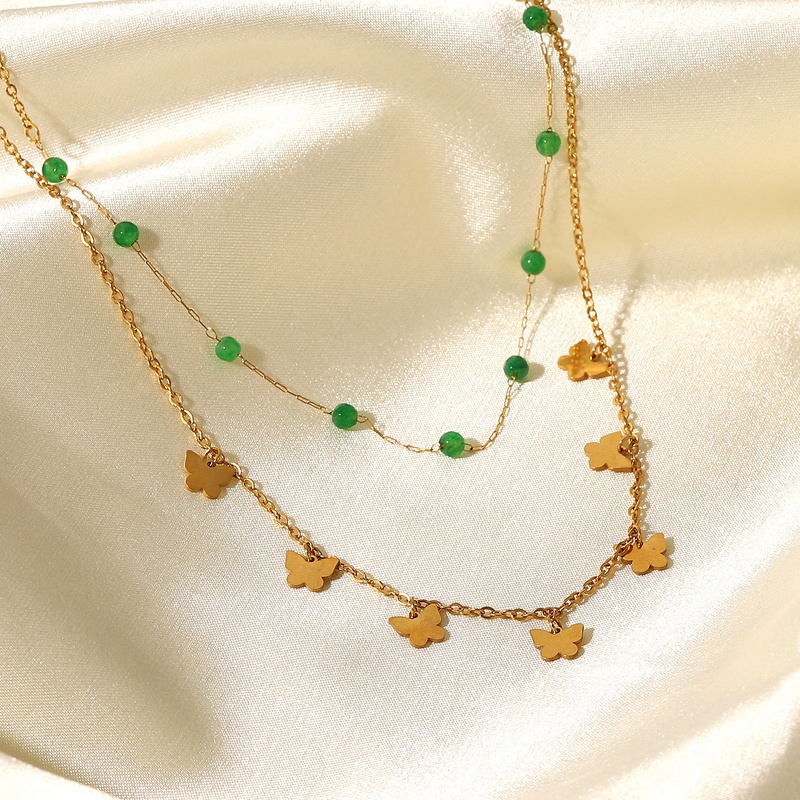 Moda 18K oro adorno de acero inoxidable piedra verde pequeñas cuentas mariposa borla doble collar de acero de titanio