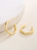 Arete minimalista geométrico de oro laminado
