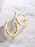 Arete minimalista geométrico de oro laminado