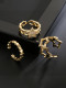 Anillo de banda vintage irregular de circonita cúbica de oro laminado