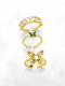 Anillo de oro laminado con circonita cúbica y mariposa.
