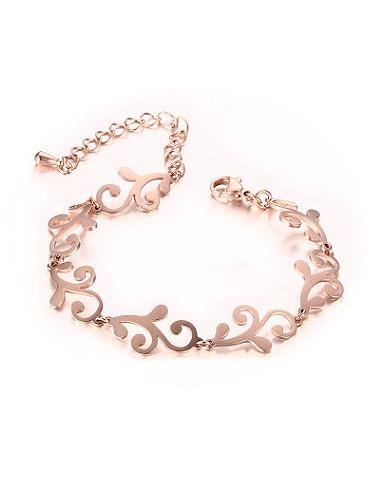 Exquisita pulsera de titanio con forma de flor chapada en oro rosa