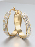 Aretes colgantes de diamantes de imitación con forma geométrica chapados en oro que combinan con todo