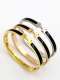 Brazalete de banda minimalista con letra de concha de titanio