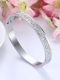 Exquisito brazalete de acero inoxidable con diamantes de imitación en forma geométrica