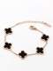 Brazalete de eslabones clásicos con flor de concha de titanio