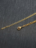 Acero inoxidable con collares de múltiples hebras con cruz simplista chapada en oro