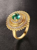 Exquisito anillo de circón chapado en oro de forma redonda verde