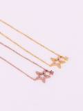 Collar delicado con estrella de titanio y circonitas cúbicas