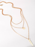 Collar minimalista de múltiples hebras con cruz de titanio