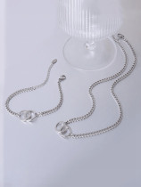Conjunto de collar y brazalete geométrico minimalista de acero titanio